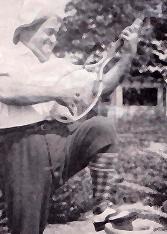 Picture of Enrico Caruso with tennis racket